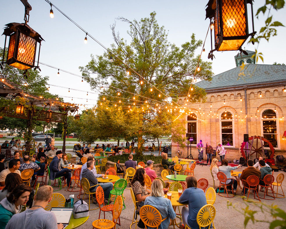 Group of people listening to Live Music outside of the Colectivo Coffee